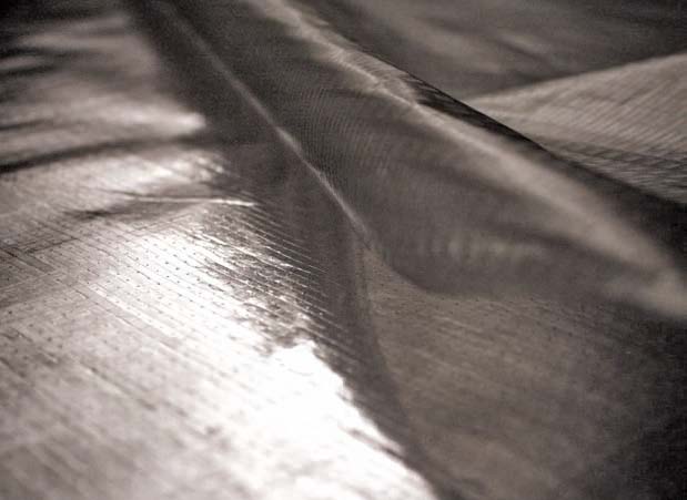 Close view of reinforced Ra-flect radiant barrier material